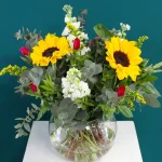 floraison_ilianthoi_kai_violetes_se_vazo_a